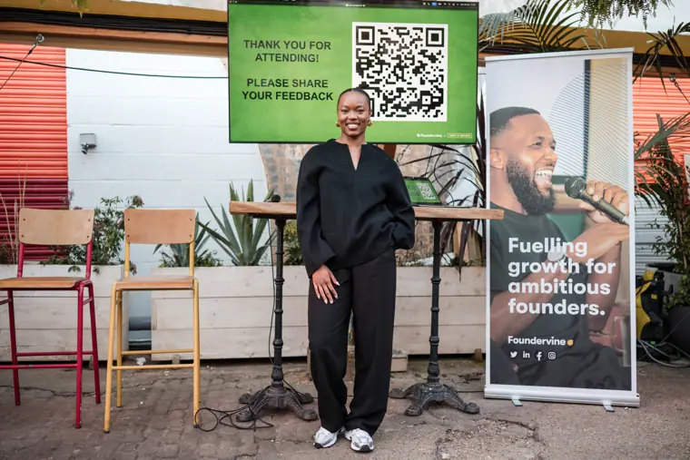 A founder poses at the Foundervine display.