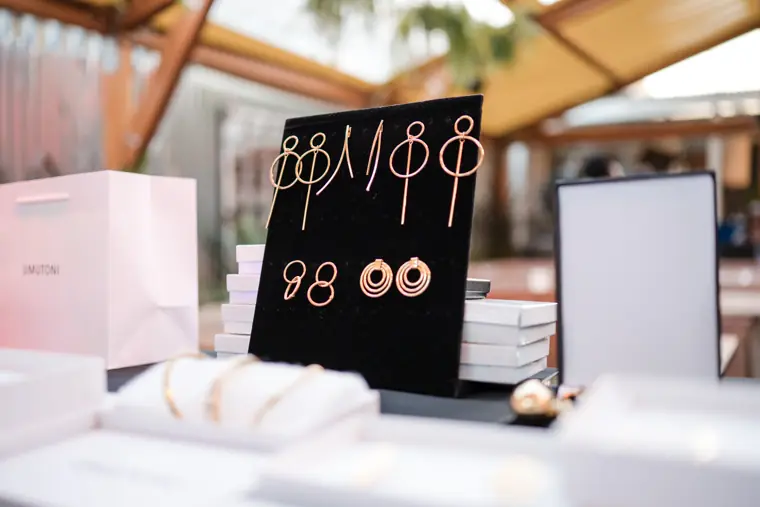 A founder displays jewellery at her stand.