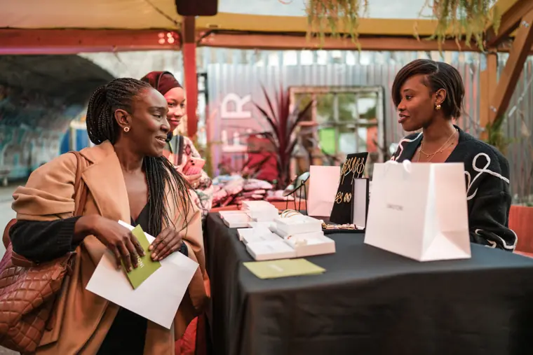 A founder discusses products at the showcase.