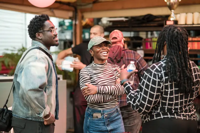 Founders and guests exchange ideas at the venue.