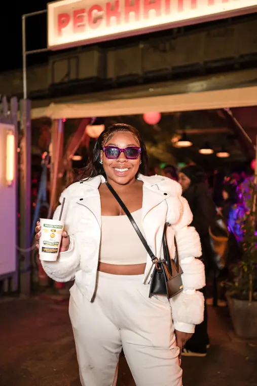 An attendee poses inside the venue.