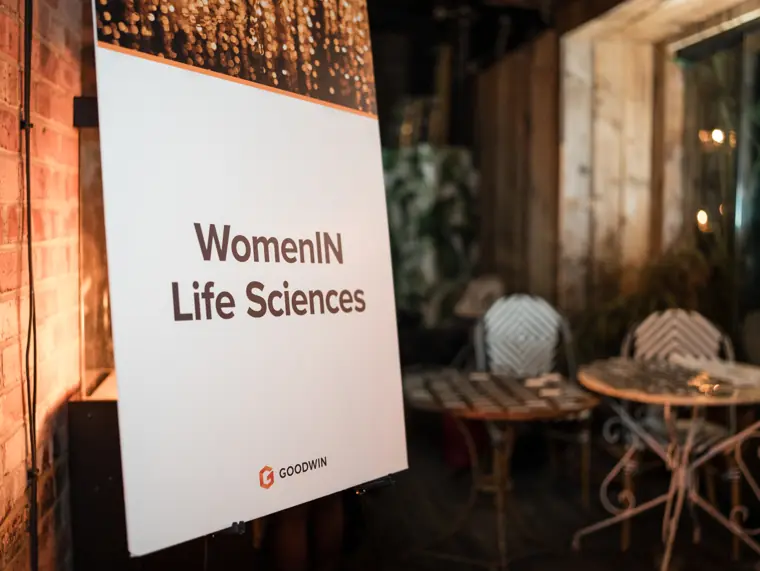 The Women in Life Sciences sign in the venue.