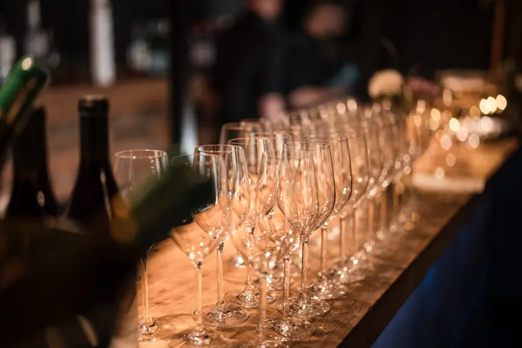 A row of drinks ready for arriving guests.
