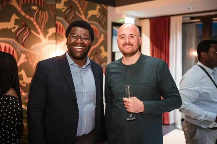 Guests connecting at Izzy Obeng’s MBE celebration.