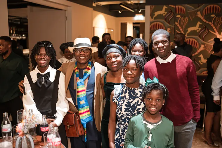 Group portrait at Izzy Obeng’s MBE celebration.