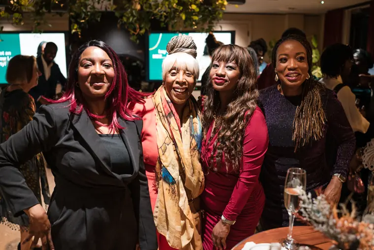 Group portrait at Izzy Obeng’s MBE celebration.