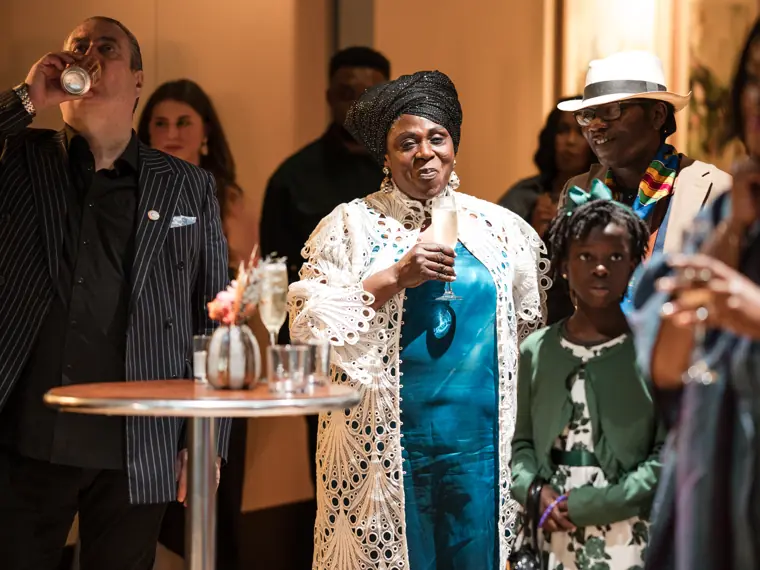 Guests connecting at Izzy Obeng’s MBE celebration.