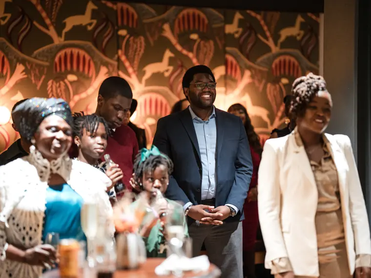 Guests connecting at Izzy Obeng’s MBE celebration.