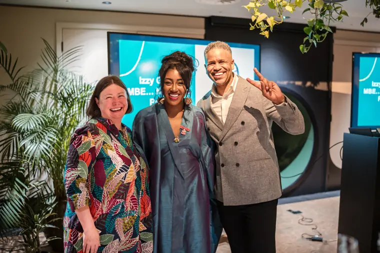 Izzy Obeng with guests at the celebration.