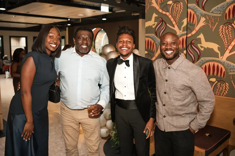 Group portrait at Izzy Obeng’s MBE celebration.