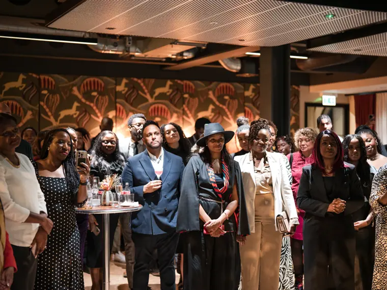 Group portrait at Izzy Obeng’s MBE celebration.