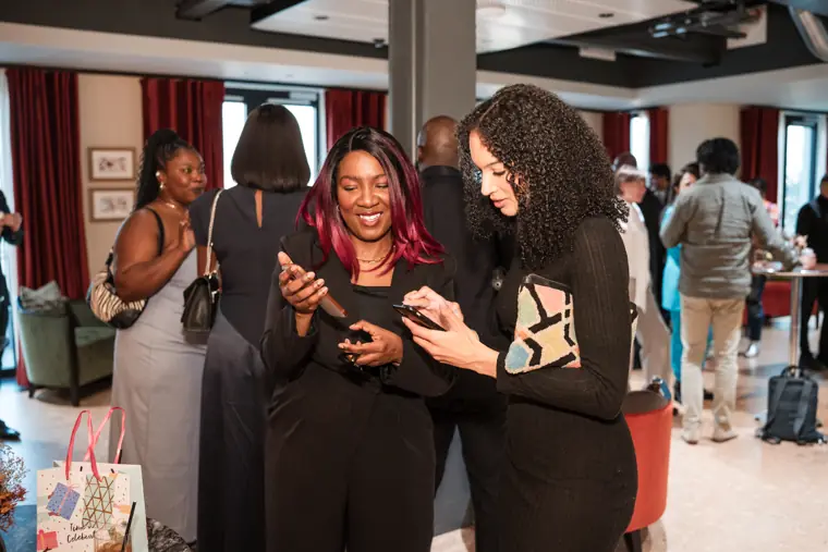 Guests connecting at Izzy Obeng’s MBE celebration.