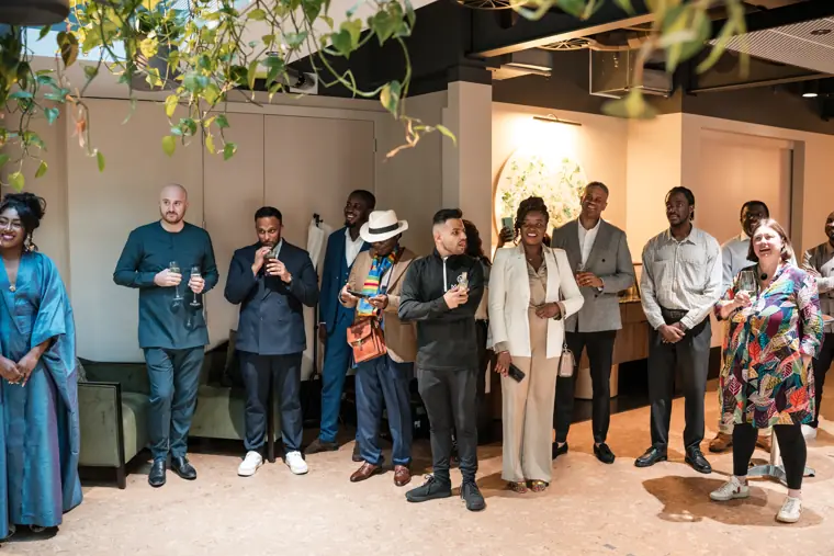 Group portrait at Izzy Obeng’s MBE celebration.