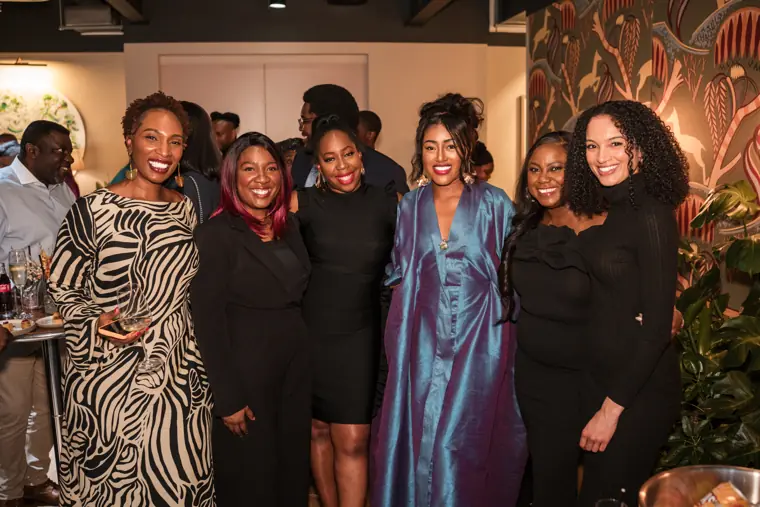 Group portrait at Izzy Obeng’s MBE celebration.