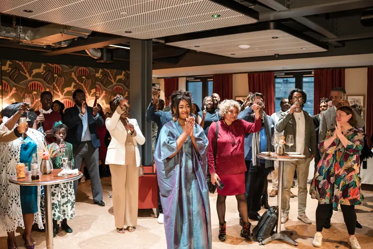 Group portrait at Izzy Obeng’s MBE celebration.