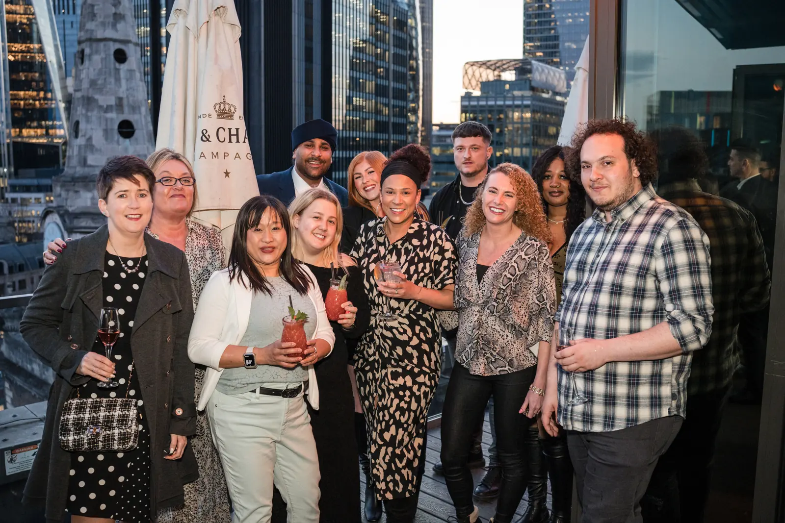 MaMedica team members posing together on the rooftop terrace.
