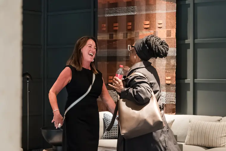 Founders and guests connecting at the showcase.