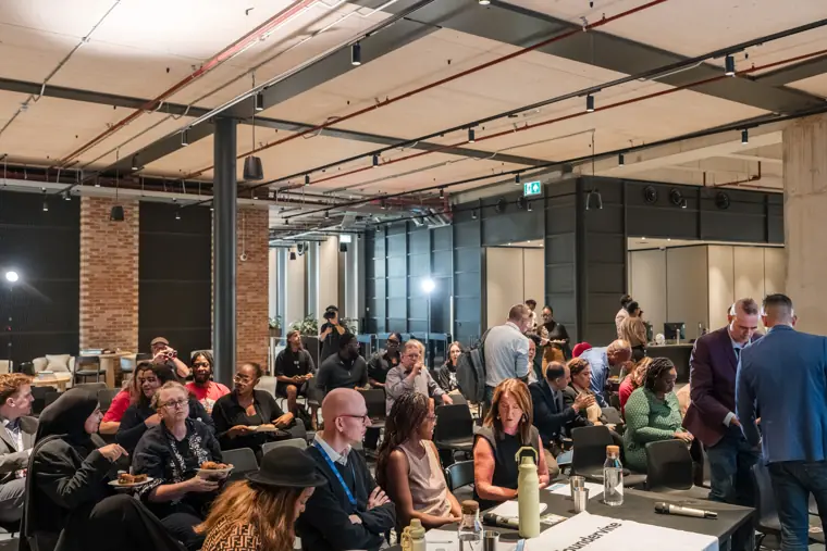 Founders and guests connecting at the showcase.