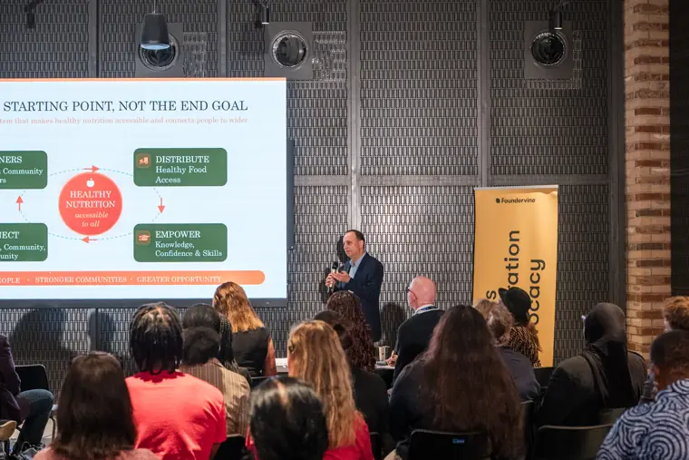 Founder presenting to the showcase audience.