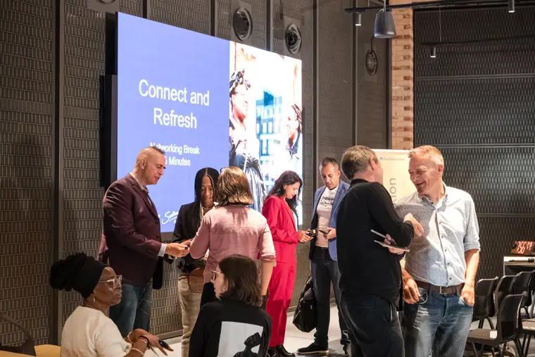 Founders and guests connecting at the showcase.