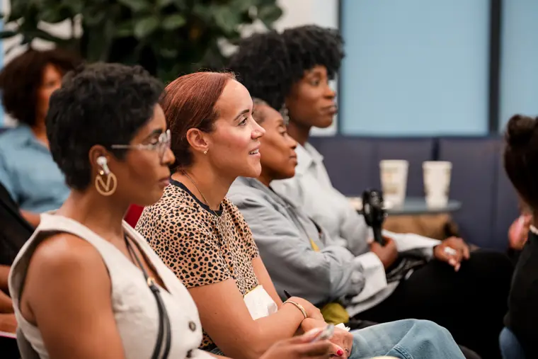 A guest responds during the business workshop.