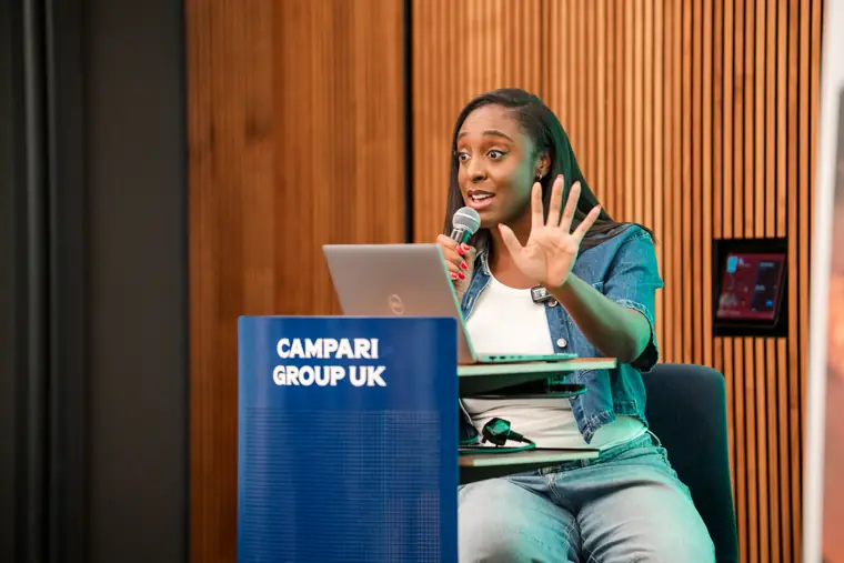 A presenter addresses the founder audience.
