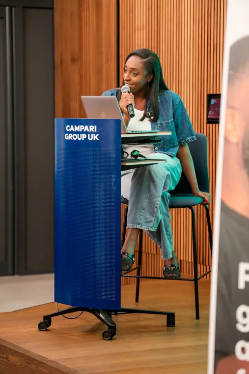 A speaker shares ideas at Wray Forward.