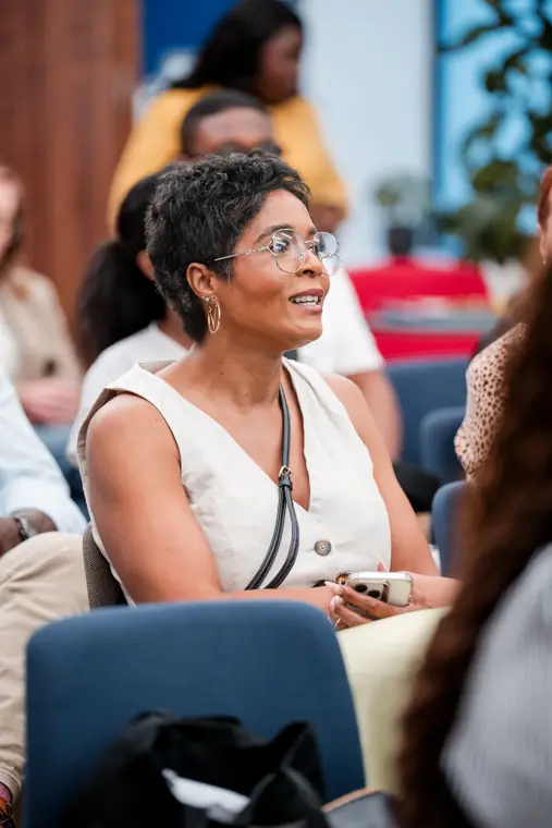 A guest responds during the business workshop.
