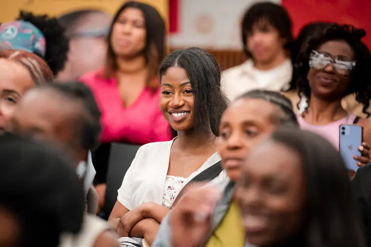 A guest responds during the business workshop.