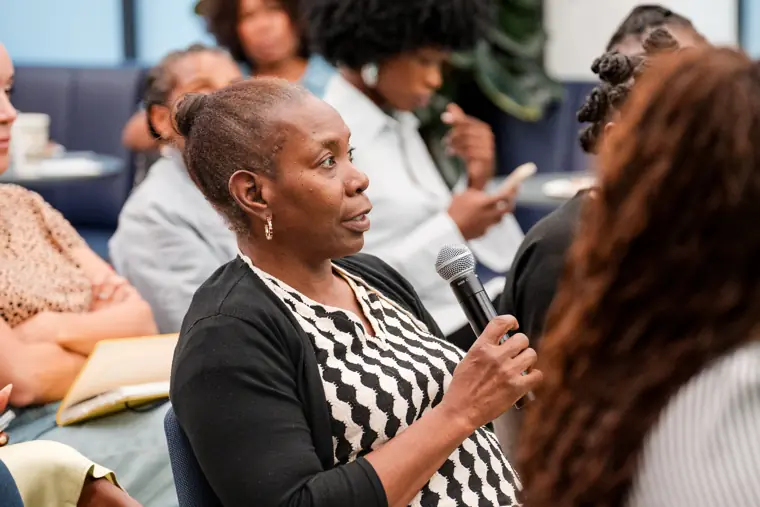 Participants listen during the workshop.