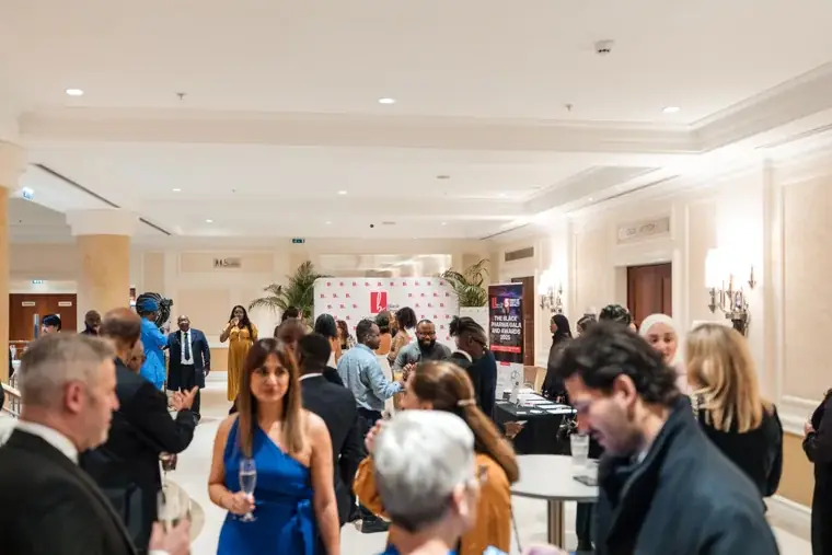 Busy reception room as guests gather before dinner at the Black Pharma fifth anniversary gala.