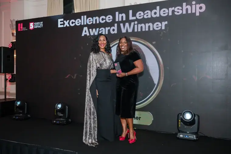 Excellence in Leadership winner receiving an award at the Black Pharma fifth anniversary gala.