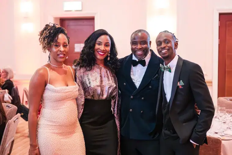 Four guests posing together during the gala at the Black Pharma fifth anniversary gala.