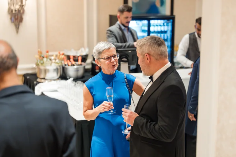 Guests chatting beside the drinks reception at the Black Pharma fifth anniversary gala.