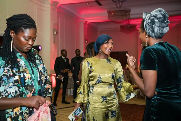 Two guests talking during the evening reception at the Black Pharma fifth anniversary gala.