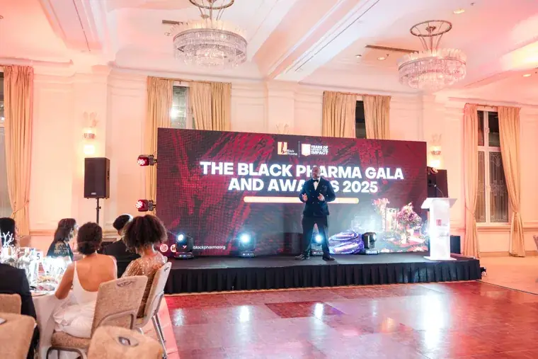 Wide view of the stage and seated gala audience at the Black Pharma fifth anniversary gala.