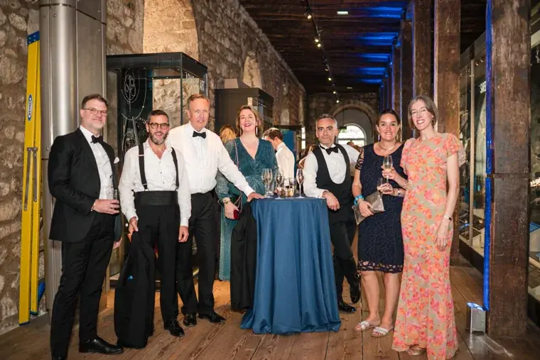 A large group of guests posing together at the indoor reception at the Chambers High Net Worth Awards 2025.