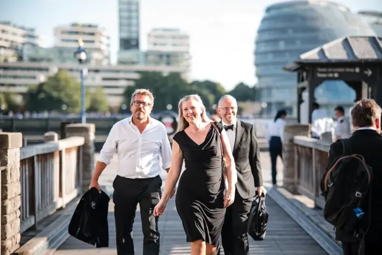 Guests arriving along the riverside walkway at the Chambers High Net Worth Awards 2025.
