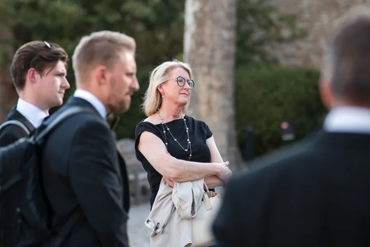 Guests listening in the leafy Tower courtyard at the Chambers High Net Worth Awards 2025.