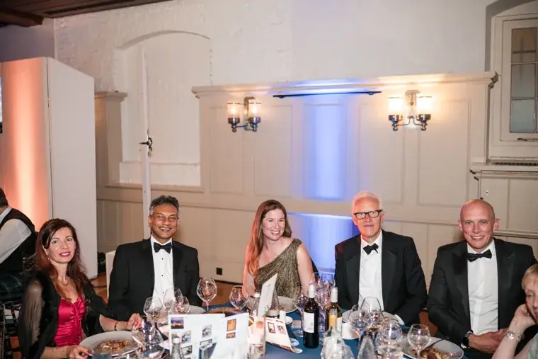 Guests seated together along a dinner table at the Chambers High Net Worth Awards 2025.