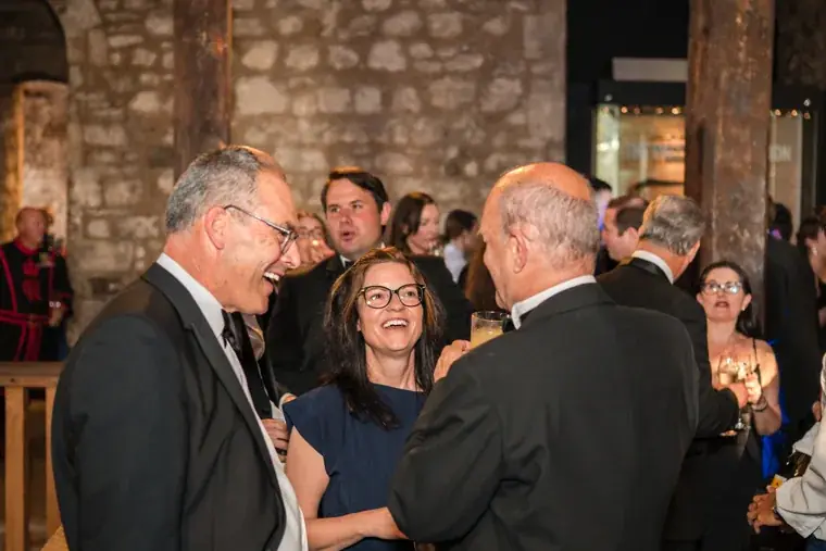 Guests sharing a conversation in the busy reception room at the Chambers High Net Worth Awards 2025.
