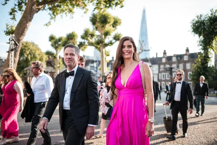 Guests walking across the courtyard in evening dress at the Chambers High Net Worth Awards 2025.