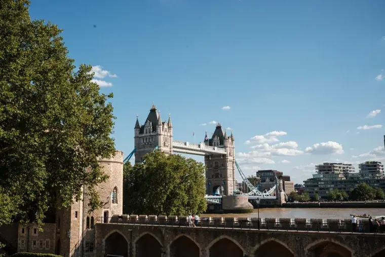 Tower Bridge seen beyond the walls of the Tower of London at the Chambers High Net Worth Awards 2025.