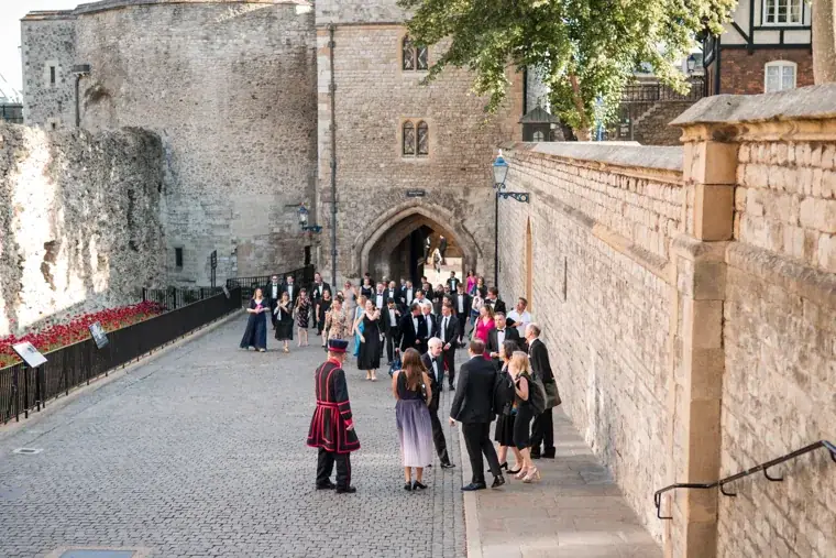 Wide view of guests walking through the Tower gateway at the Chambers High Net Worth Awards 2025.