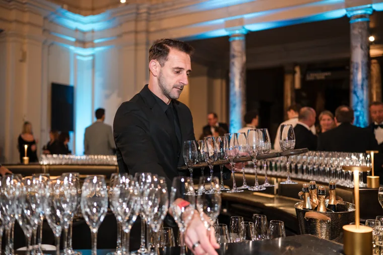 A bartender pouring drinks at the reception at the Chambers UK Awards winter edition.