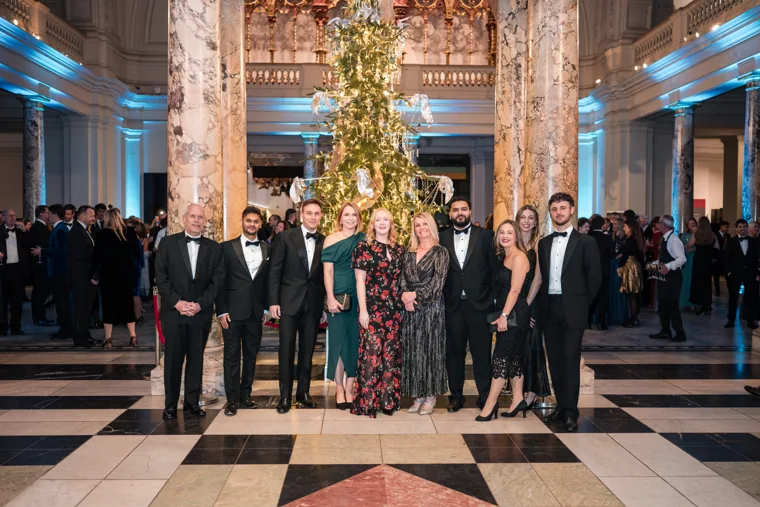 A large group posing in the entrance hall at the Chambers UK Awards winter edition.