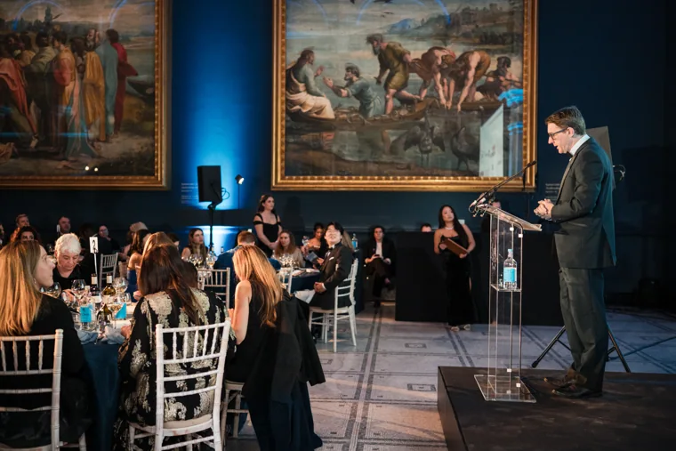 A presenter speaking on the awards stage at the Chambers UK Awards winter edition.