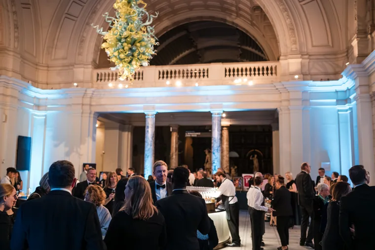 Guests gathering beneath the decorated hall ceiling at the Chambers UK Awards winter edition.
