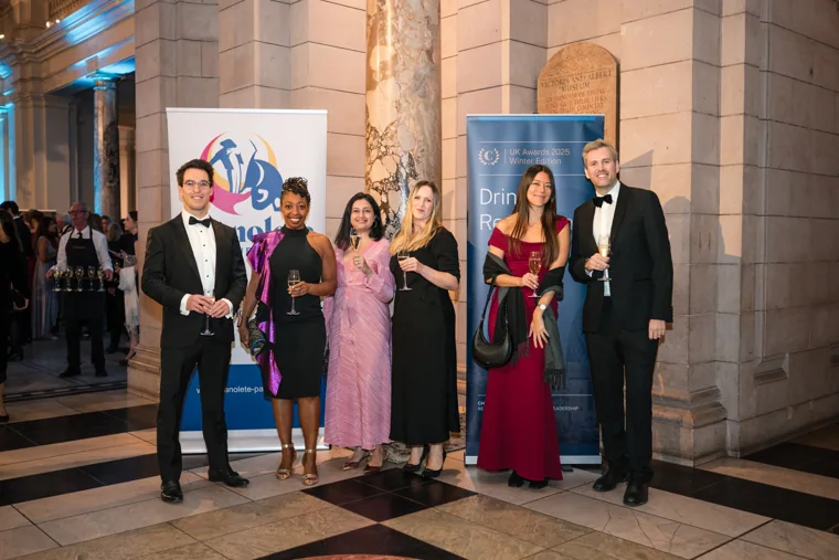 Guests posing in the marble entrance hall at the Chambers UK Awards winter edition.
