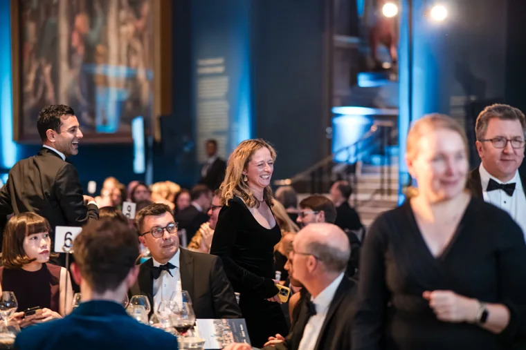 Guests standing among the dinner tables at the Chambers UK Awards winter edition.
